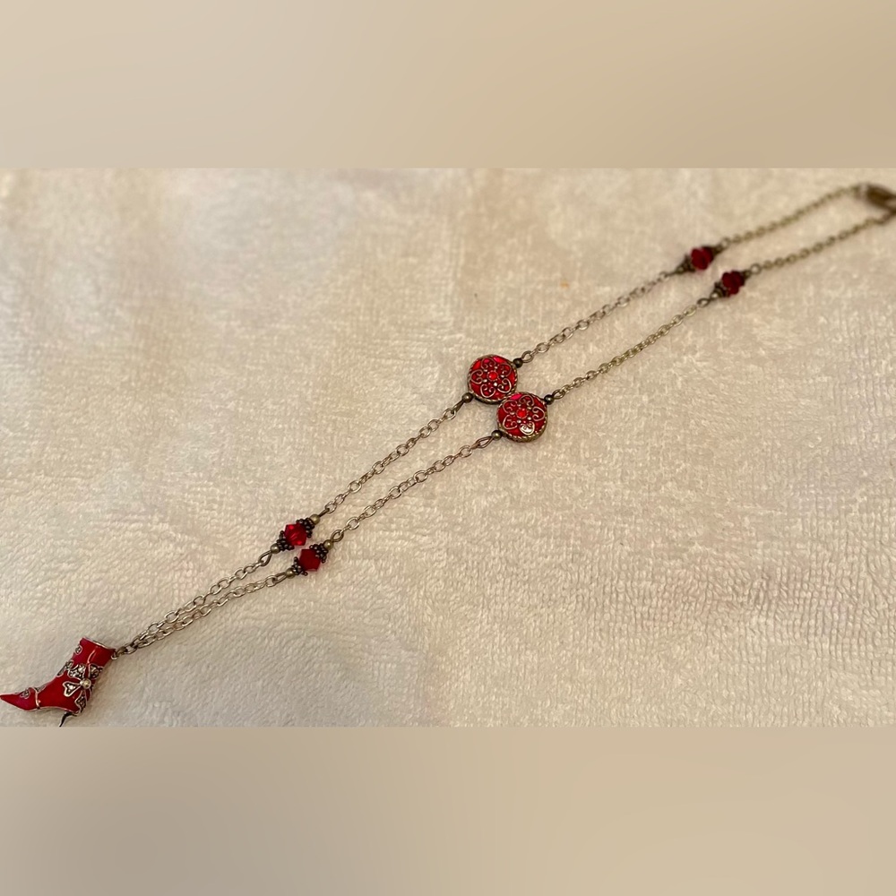 Necklace w/ gold tone chain, red beads and a fancy boot charm-see pics